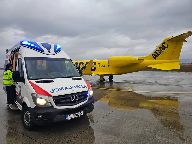 Ground ambulance meeting an air-ambulance jet